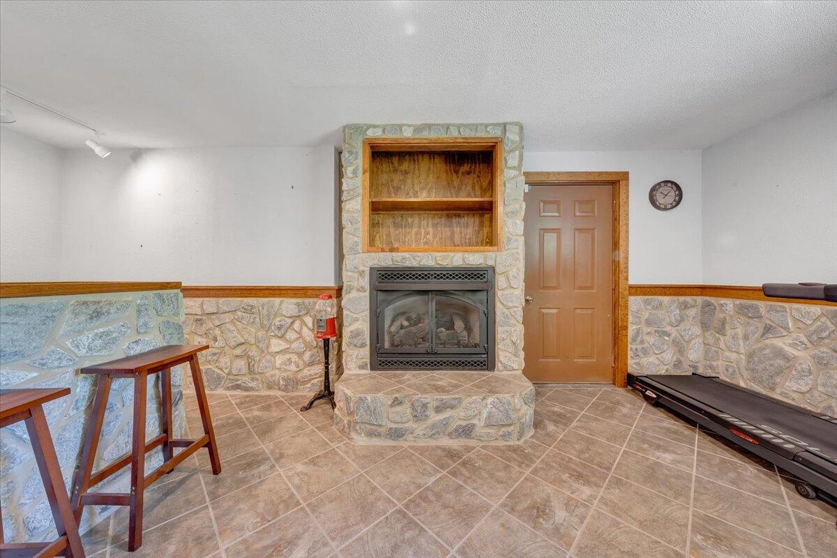 13357 Callaway Road Callaway, VA 24067 - Photo 39 of 62 a view of livingroom with an empty space and a fireplace