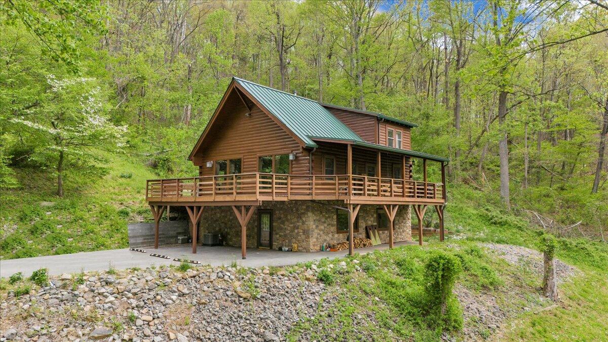 13357 Callaway Road Callaway, VA 24067 - Photo 46 of 62 a backyard of a house with table and chairs