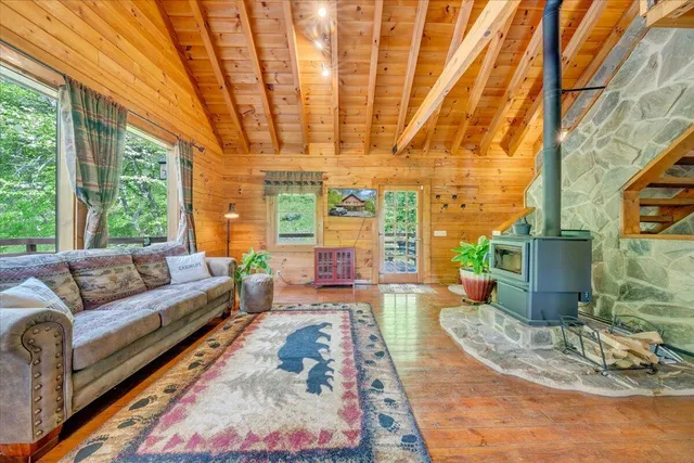 a living room with furniture and a table