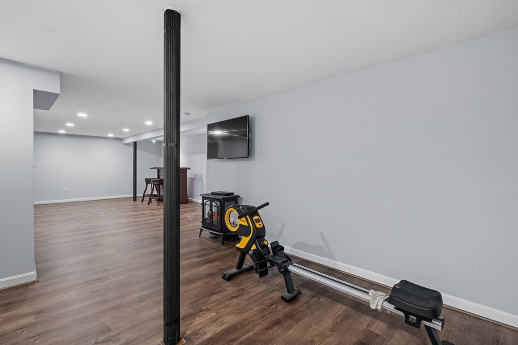 40 Gaita Drive Derry, NH 03038 - Photo 27 of 34 a view of a workspace with furniture and a mirror