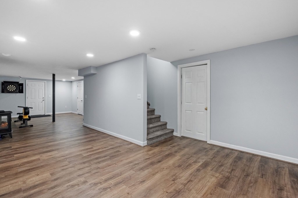 40 Gaita Drive Derry, NH 03038 - Photo 28 of 34 a view of a livingroom with wooden floor