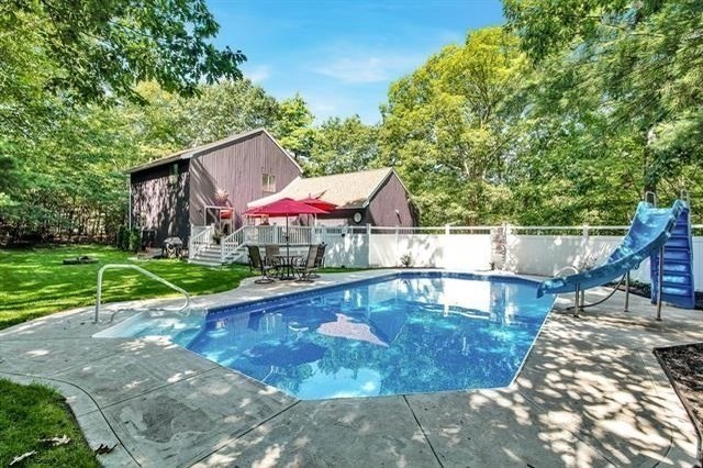 40 Gaita Drive Derry, NH 03038 - Photo 5 of 34 a view of a swimming pool with a patio