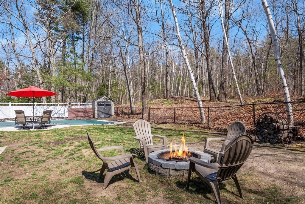 40 Gaita Drive Derry, NH 03038 - Photo 7 of 34 a view of a swimming pool with a lounge chairs