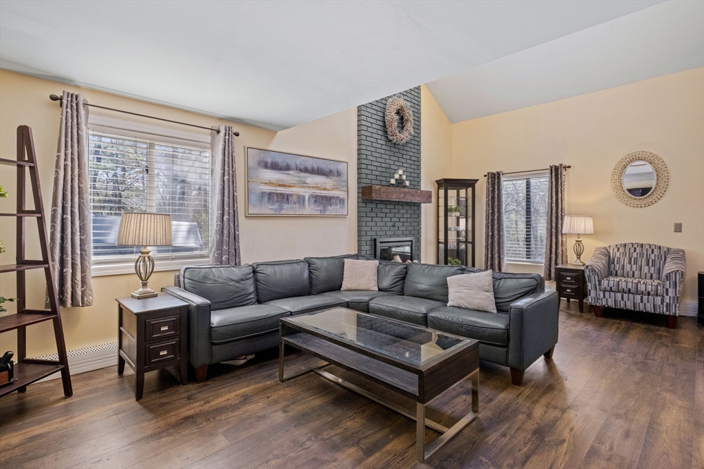 40 Gaita Drive Derry, NH 03038 - Photo 9 of 34 a living room with furniture and a large window