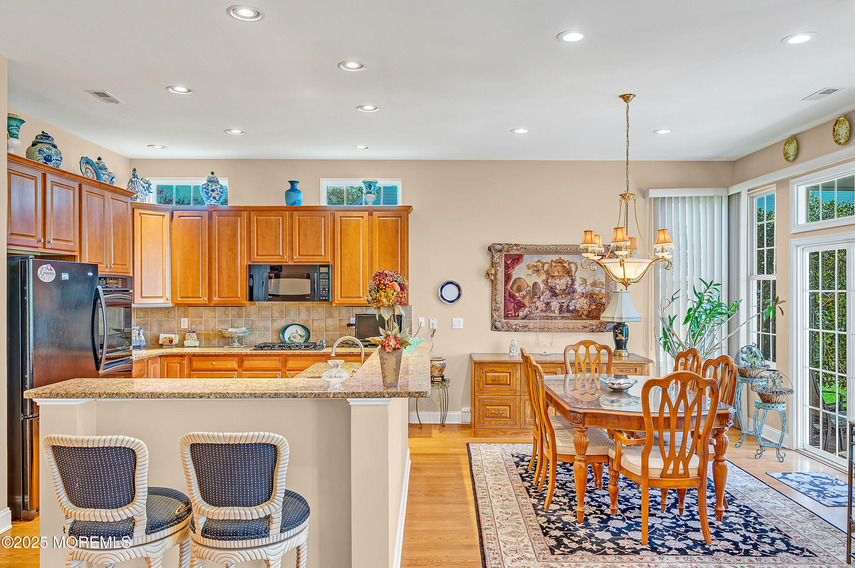 2 Carleton Drive Freehold, NJ 07728 - Photo 14 of 40 a kitchen with stainless steel appliances granite countertop a sink and a refrigerator