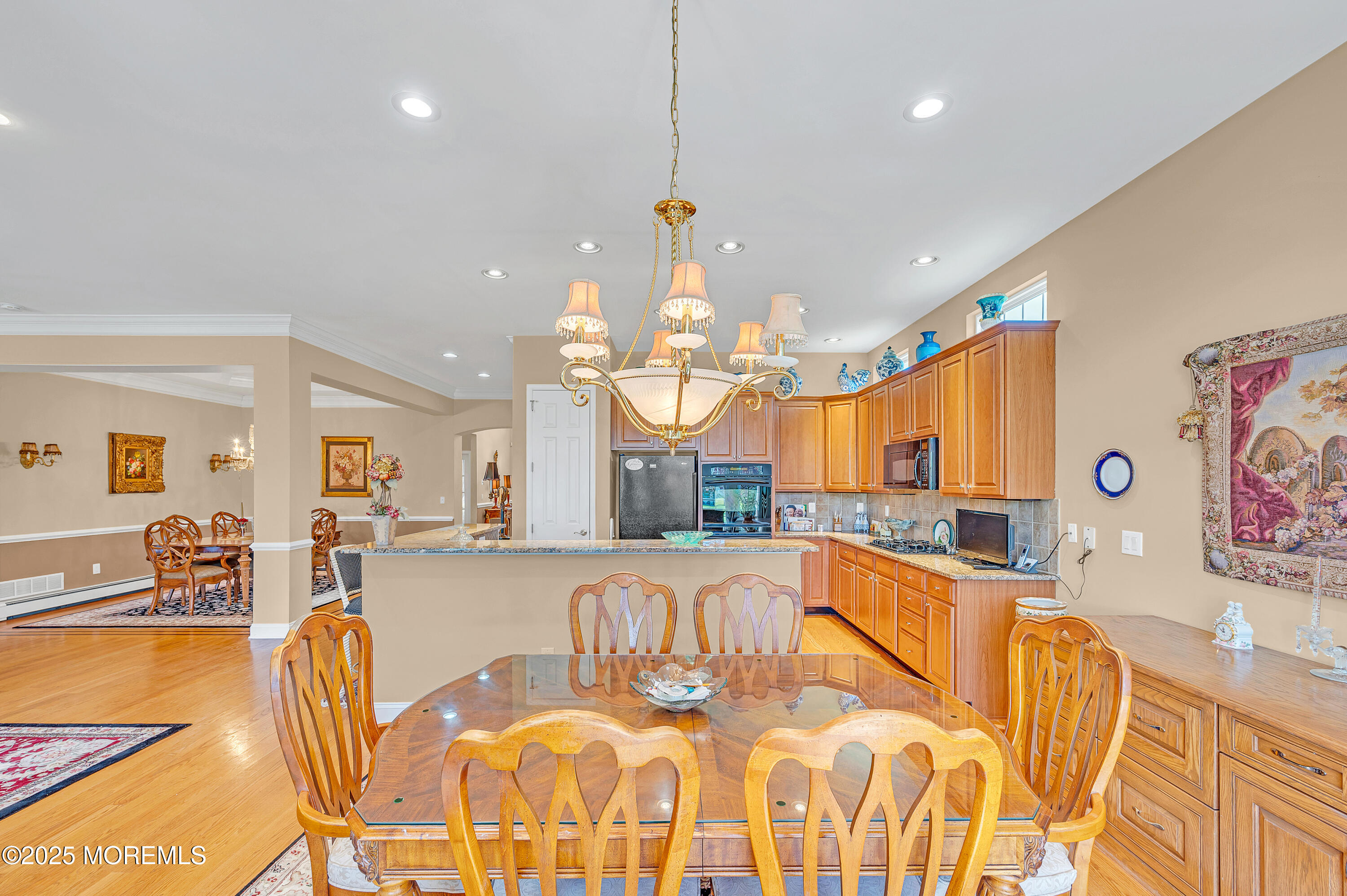 2 Carleton Drive Freehold, NJ 07728 - Photo 16 of 40 a large kitchen with a table and chairs