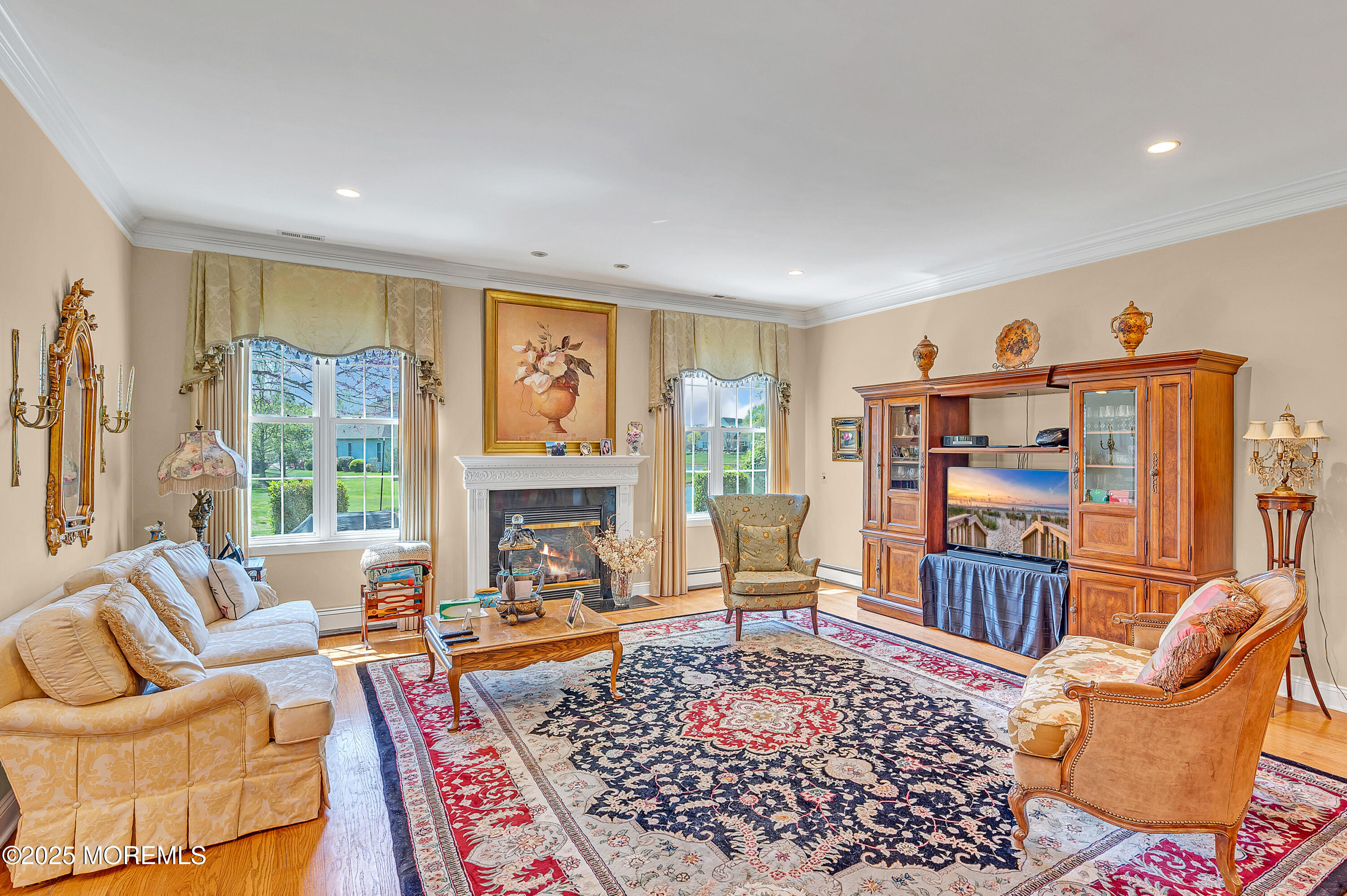 2 Carleton Drive Freehold, NJ 07728 - Photo 22 of 40 a living room with furniture a rug and a large window