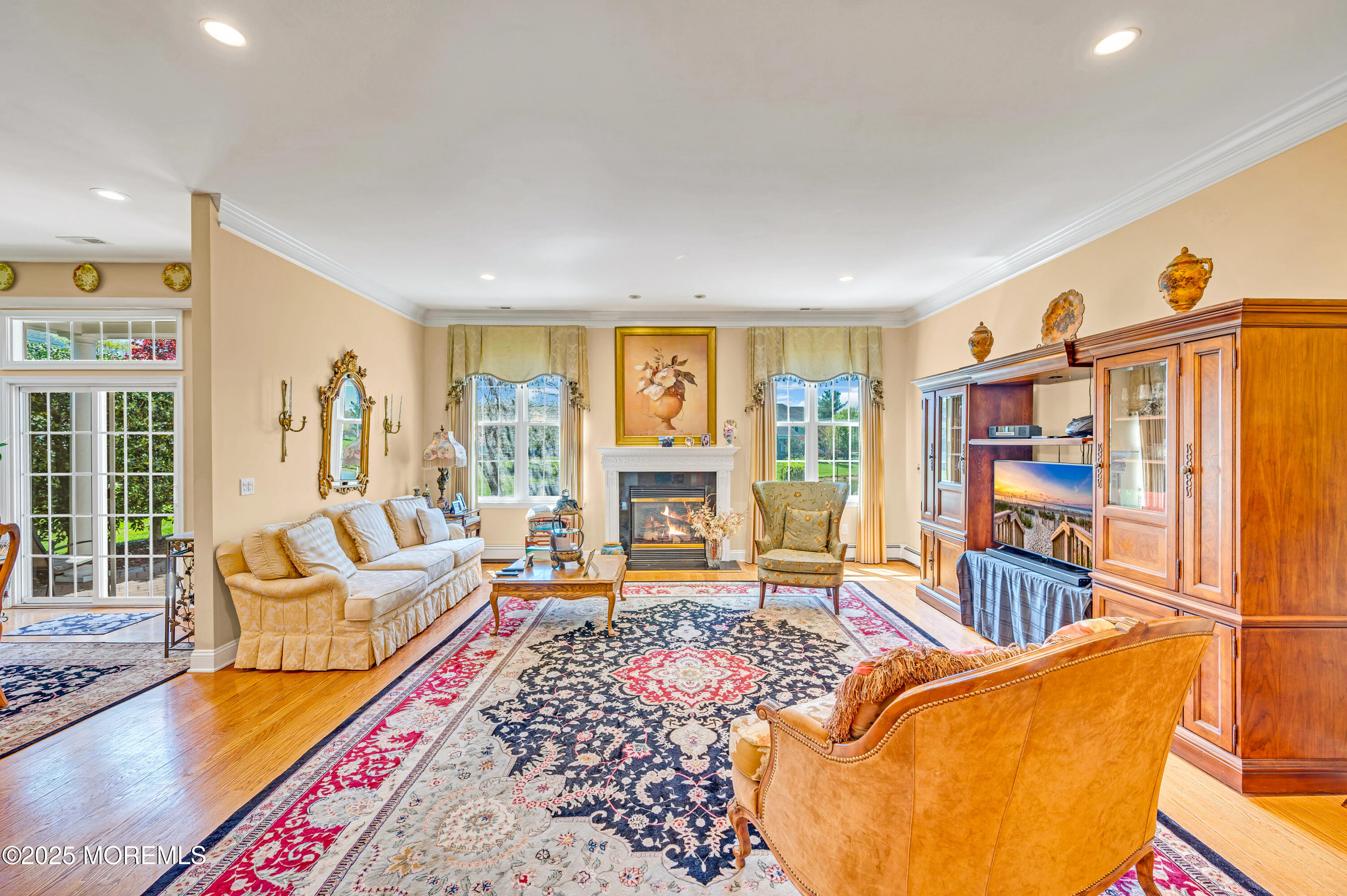 2 Carleton Drive Freehold, NJ 07728 - Photo 23 of 40 a living room with furniture and a floor to ceiling window