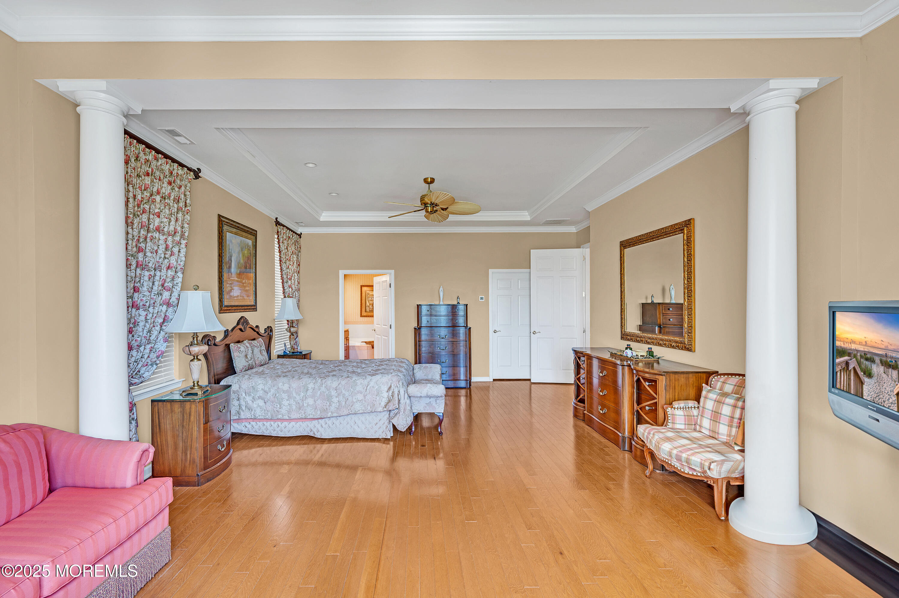 2 Carleton Drive Freehold, NJ 07728 - Photo 28 of 40 a living room with furniture and a chandelier