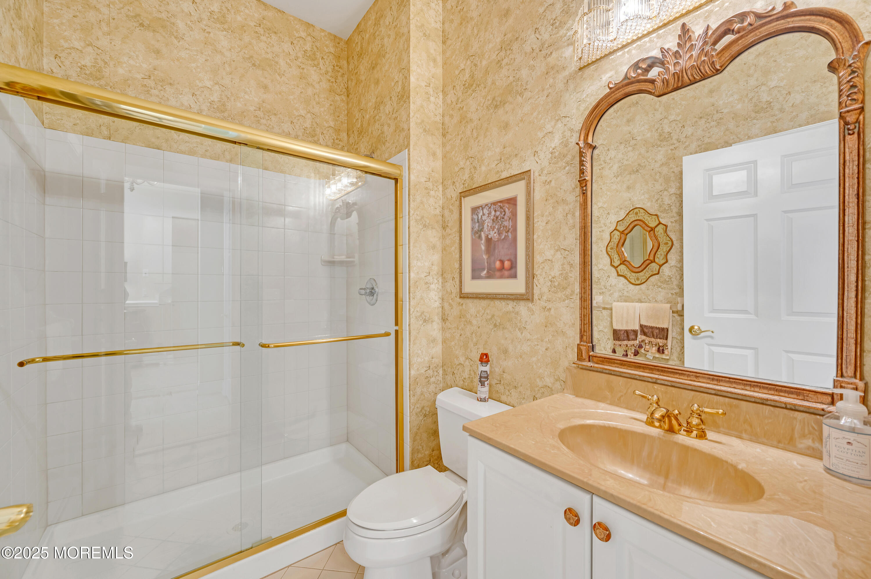 2 Carleton Drive Freehold, NJ 07728 - Photo 31 of 40 a bathroom with a sink a toilet and a shower