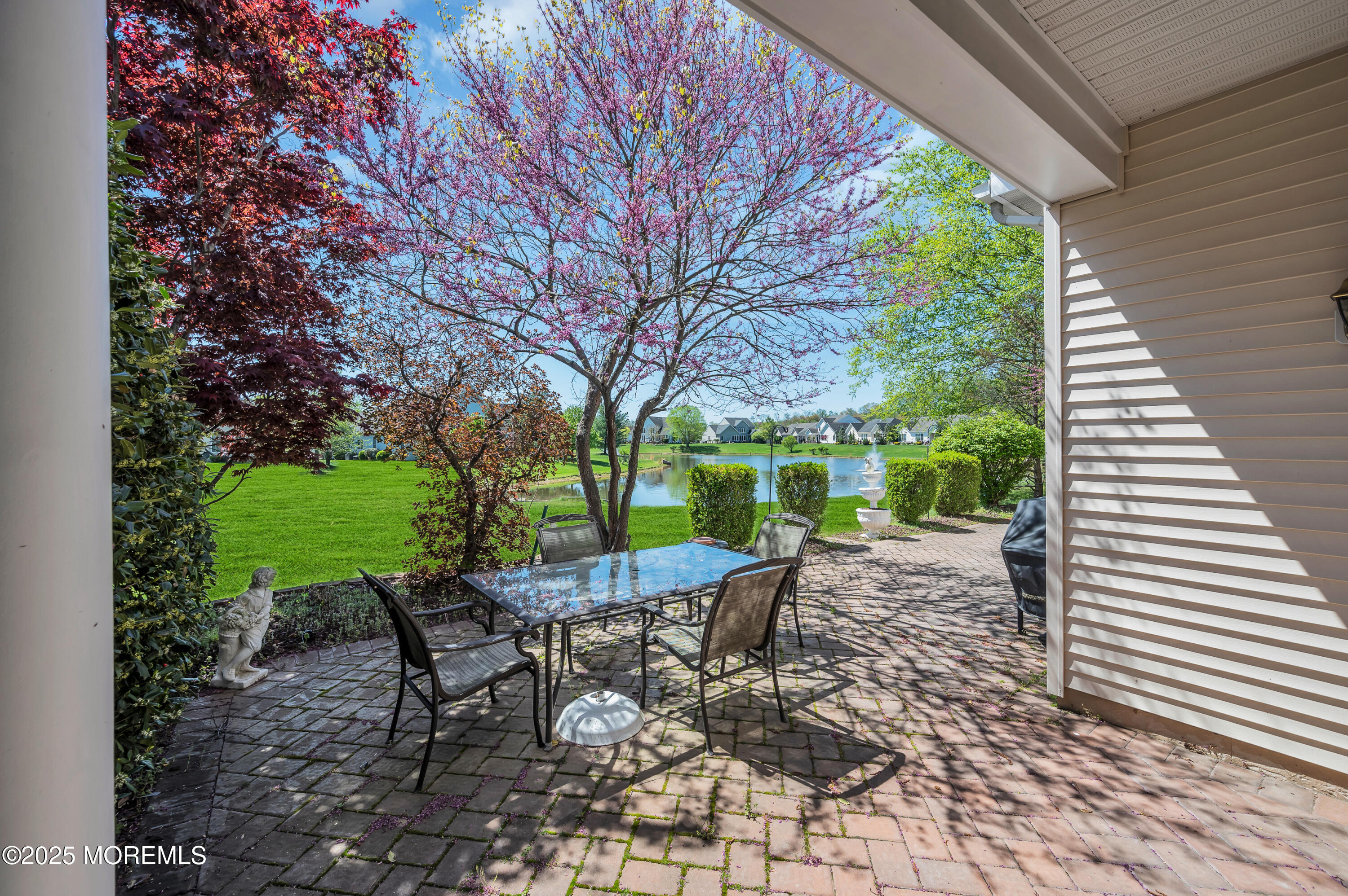 2 Carleton Drive Freehold, NJ 07728 - Photo 33 of 40 a view of a backyard with sitting area furniture and garden