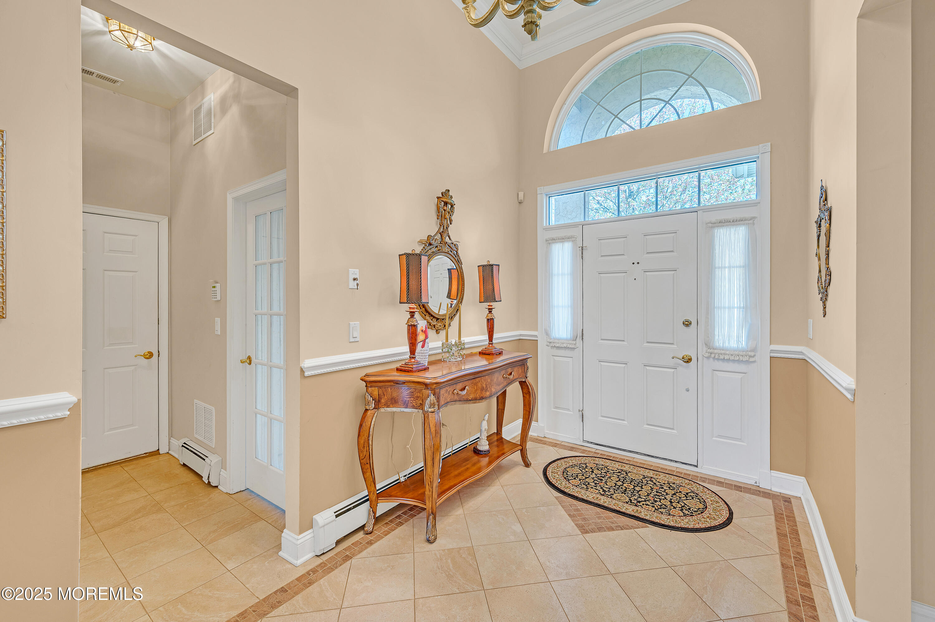 2 Carleton Drive Freehold, NJ 07728 - Photo 4 of 40 a room with gym equipment and a mirror