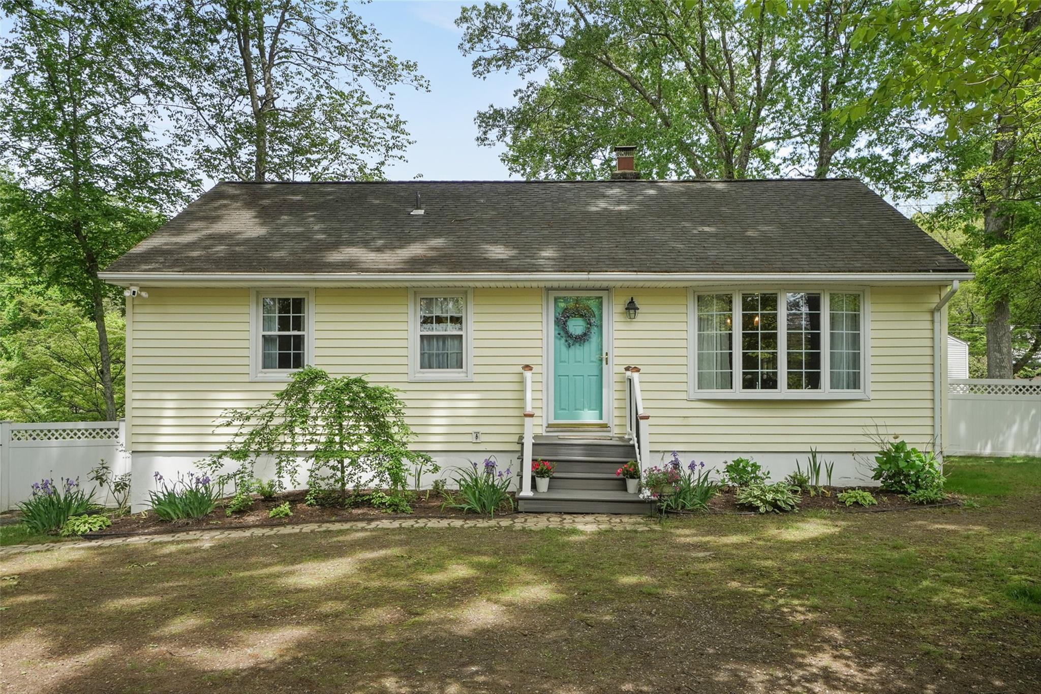 front view of house with a yard