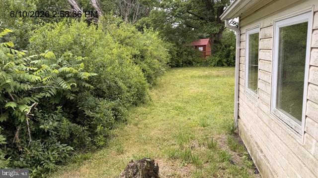 2060 Adams Road East Greenville, PA 18041 - Photo 10 of 32 Lush greenery frames a cozy home.