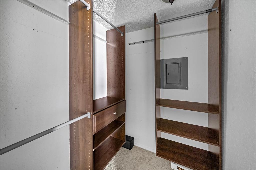 9811 Walnut Street, Unit 201 Dallas, TX 75243 - Photo 14 of 15 a view of closet area