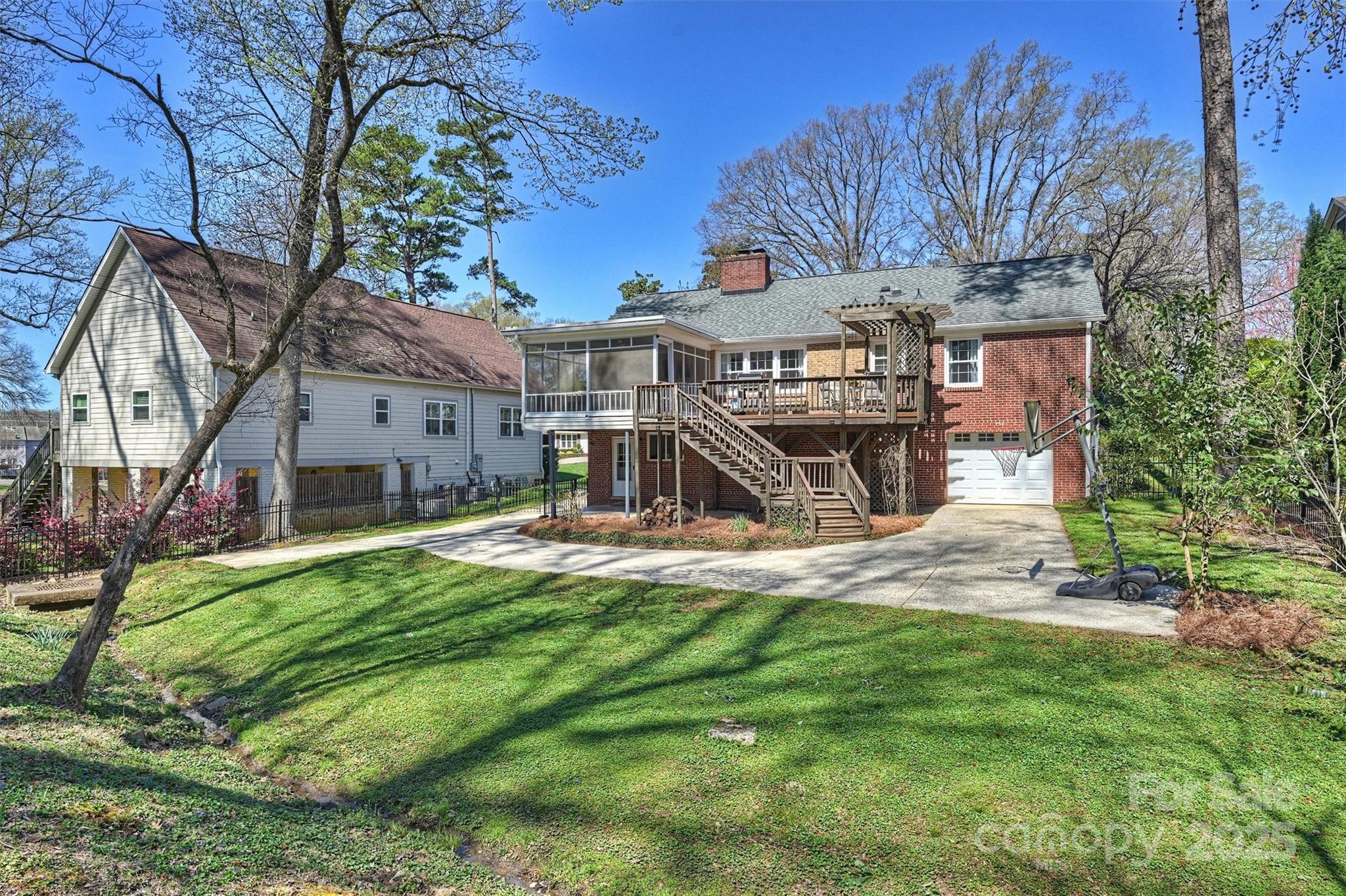 138 Scofield Road Charlotte, NC 28209 - Photo 35 of 36 a view of a house with a yard