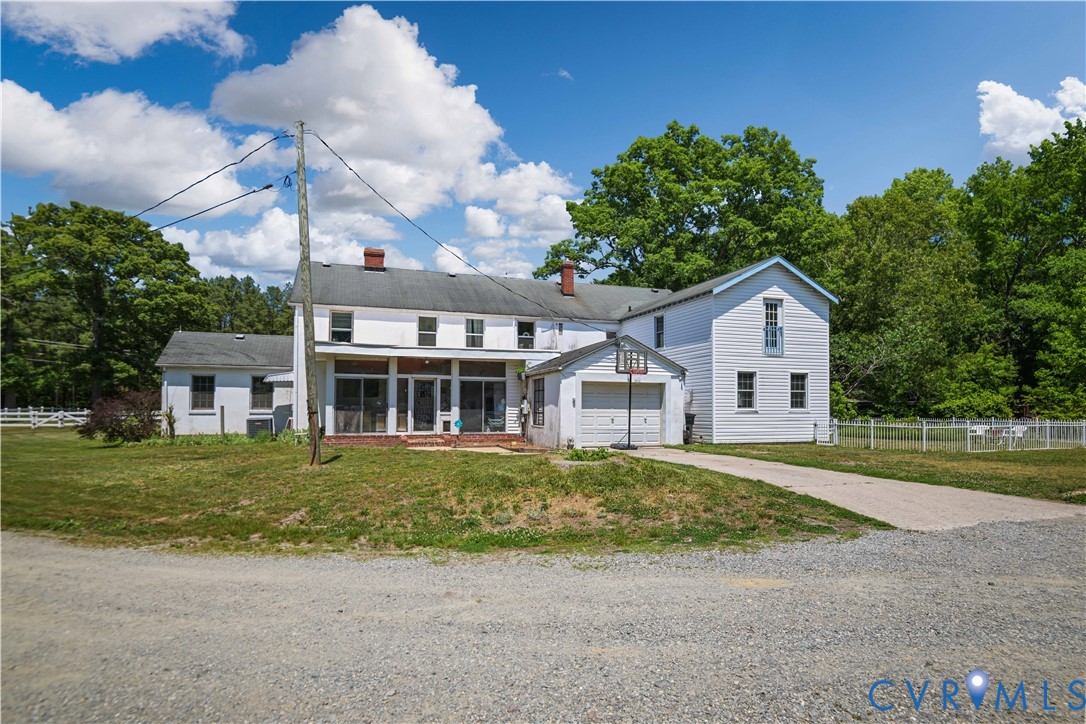 6243 Studley Road Mechanicsville, VA 23116 - Photo 60 of 65 a front view of a house with a yard