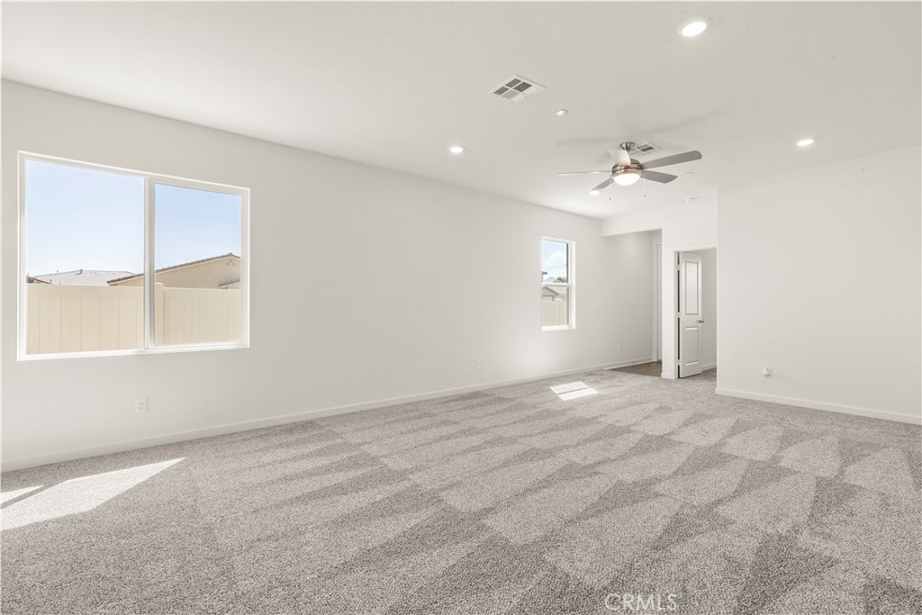 42484 Isla Court Indio, CA 92201 - Photo 4 of 16 a view of an empty room with a window