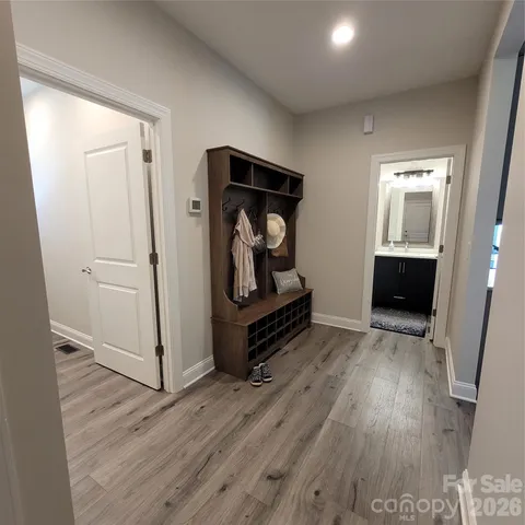 an entryway at livingroom with furniture and wooden floor