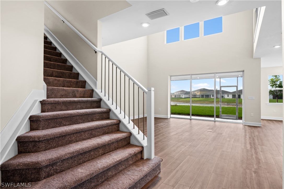 42548 Little Ridge Road Punta Gorda, FL 33982 - Photo 12 of 50 a view of an entryway with wooden floor