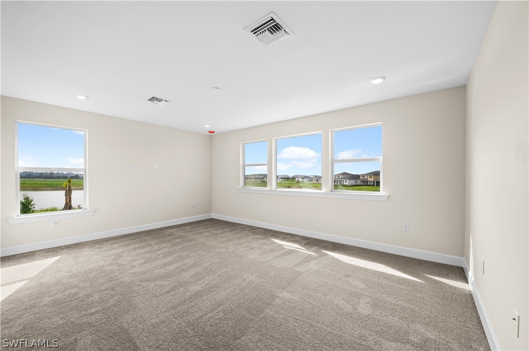 42548 Little Ridge Road Punta Gorda, FL 33982 - Photo 15 of 50 an empty room with a window