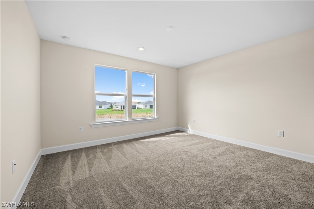 42548 Little Ridge Road Punta Gorda, FL 33982 - Photo 19 of 50 an empty room with windows