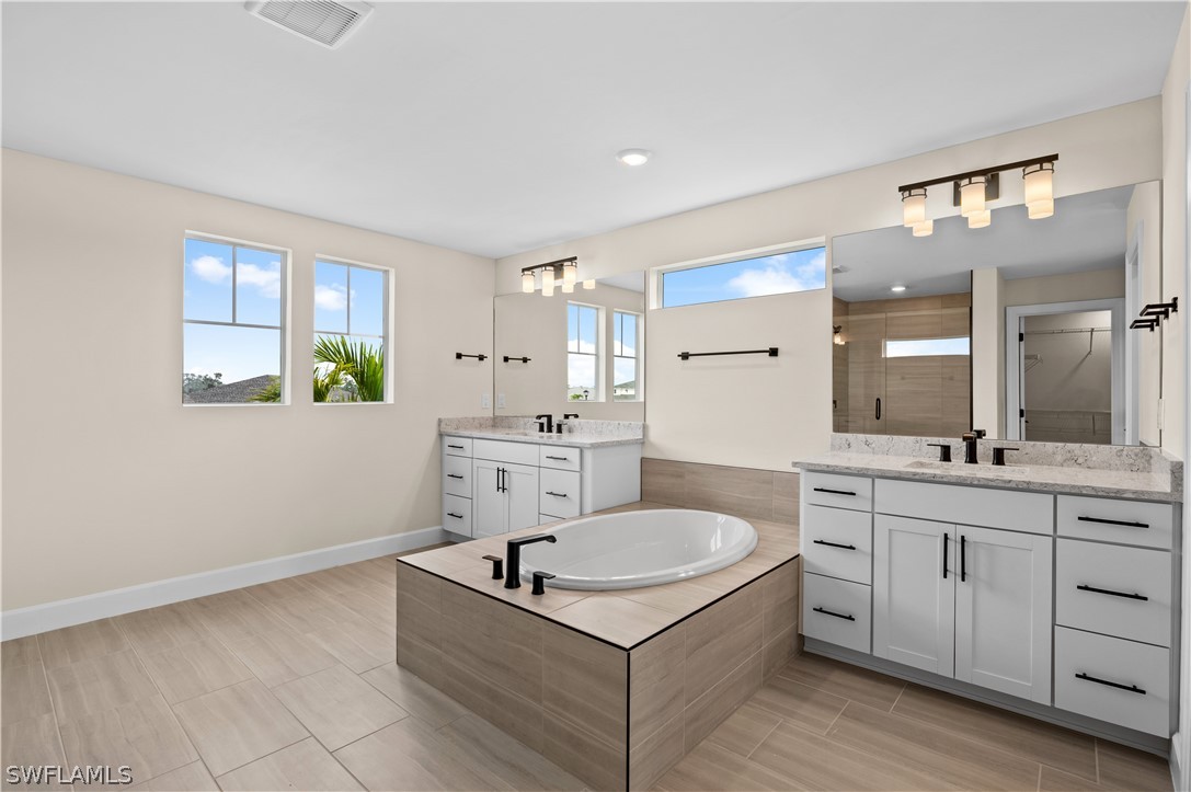 42548 Little Ridge Road Punta Gorda, FL 33982 - Photo 22 of 50 a kitchen with a sink appliances and cabinets