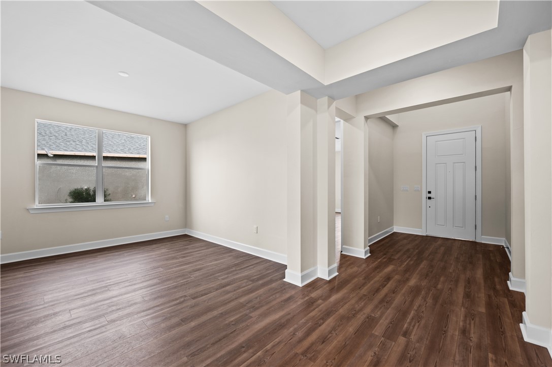 42548 Little Ridge Road Punta Gorda, FL 33982 - Photo 34 of 50 an empty room with wooden floor closet and windows
