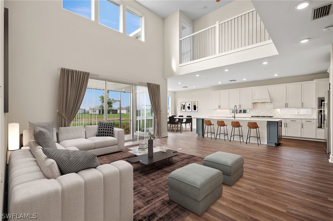 42548 Little Ridge Road Punta Gorda, FL 33982 - Photo 7 of 50 a living room with furniture and a large window