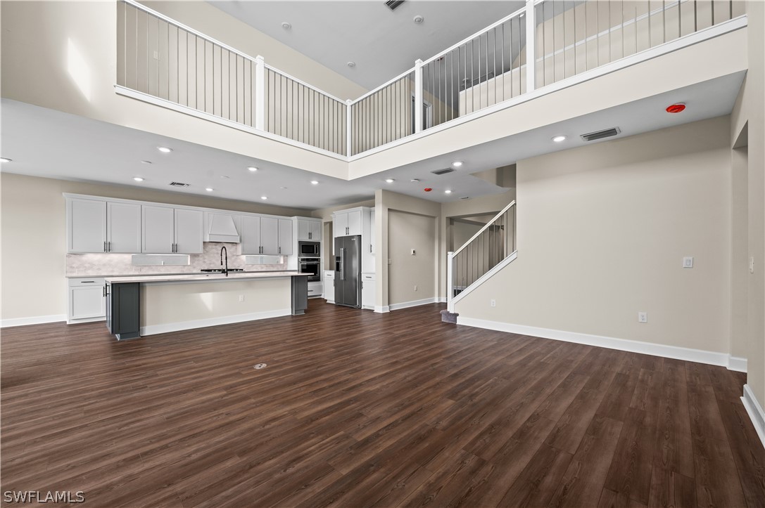 42548 Little Ridge Road Punta Gorda, FL 33982 - Photo 10 of 50 a view of kitchen with kitchen island and stainless steel appliances