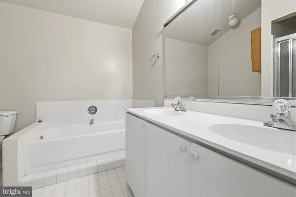 a bathroom with a sink and a bathtub