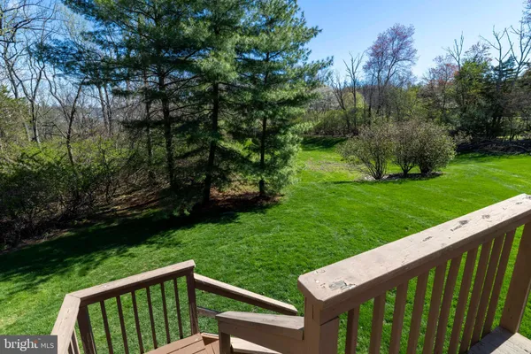 a view of a wooden deck with garden