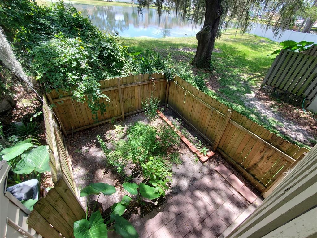 2207 Southwest 39 Drive Gainesville, FL 32607 - Photo 22 of 22 a view of backyard with garden