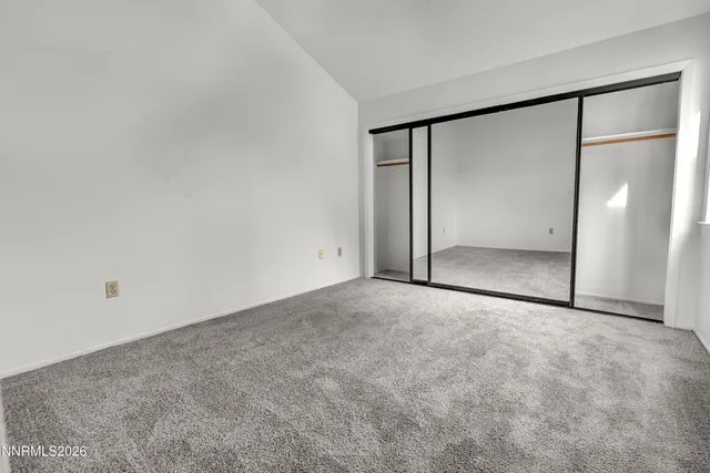 a bathroom with a toilet a sink and bathtub