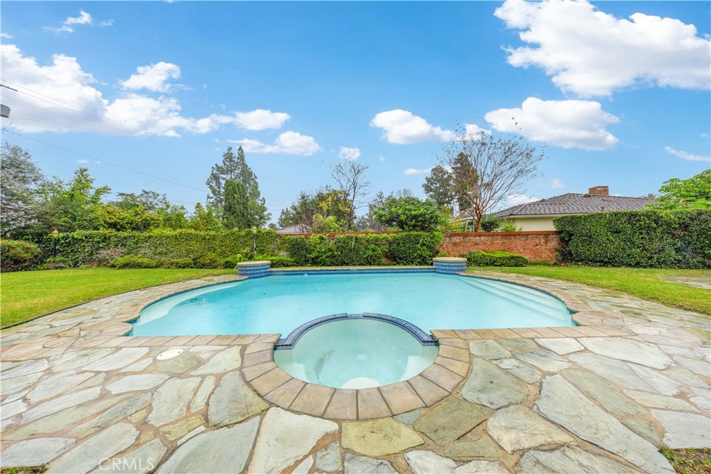 2835 Devonport Road San Marino, CA 91108 - Photo 41 of 54 a view of a swimming pool with a yard