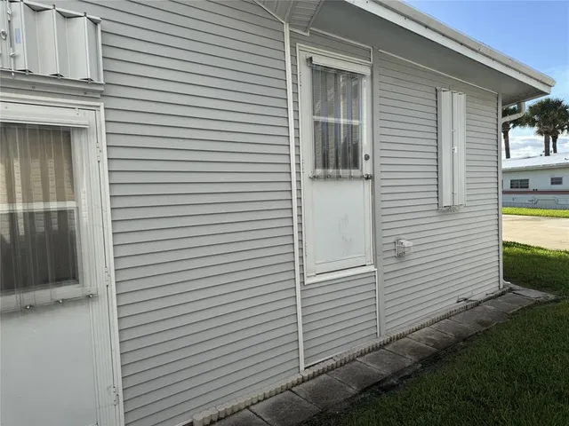 a view of a porch with a door