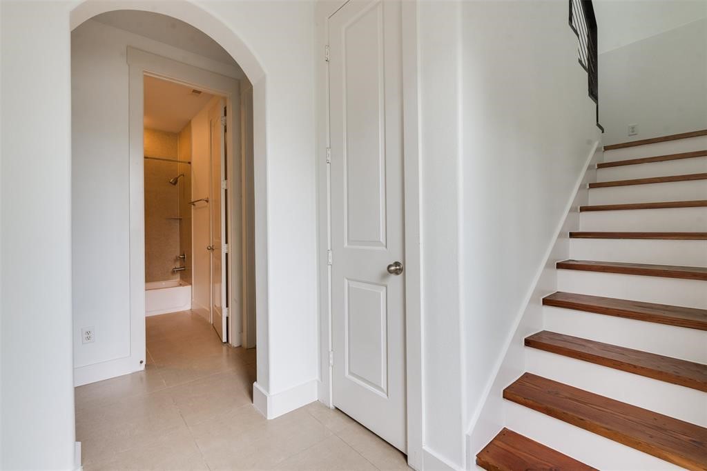 2002 Blodgett Street Houston, TX 77004 - Photo 2 of 43 a view of a hallway with wooden floor and entryway