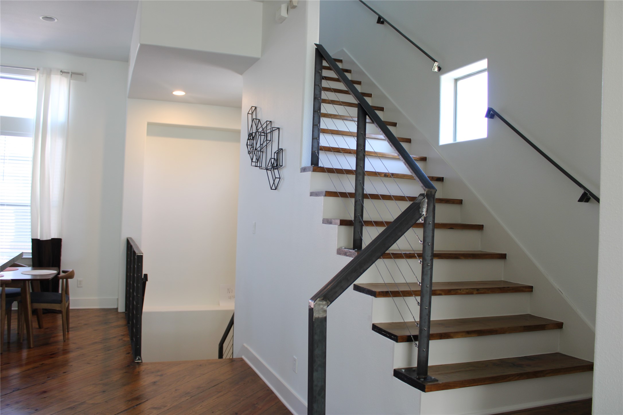 2002 Blodgett Street Houston, TX 77004 - Photo 26 of 43 a view of entryway and hall with wooden floor
