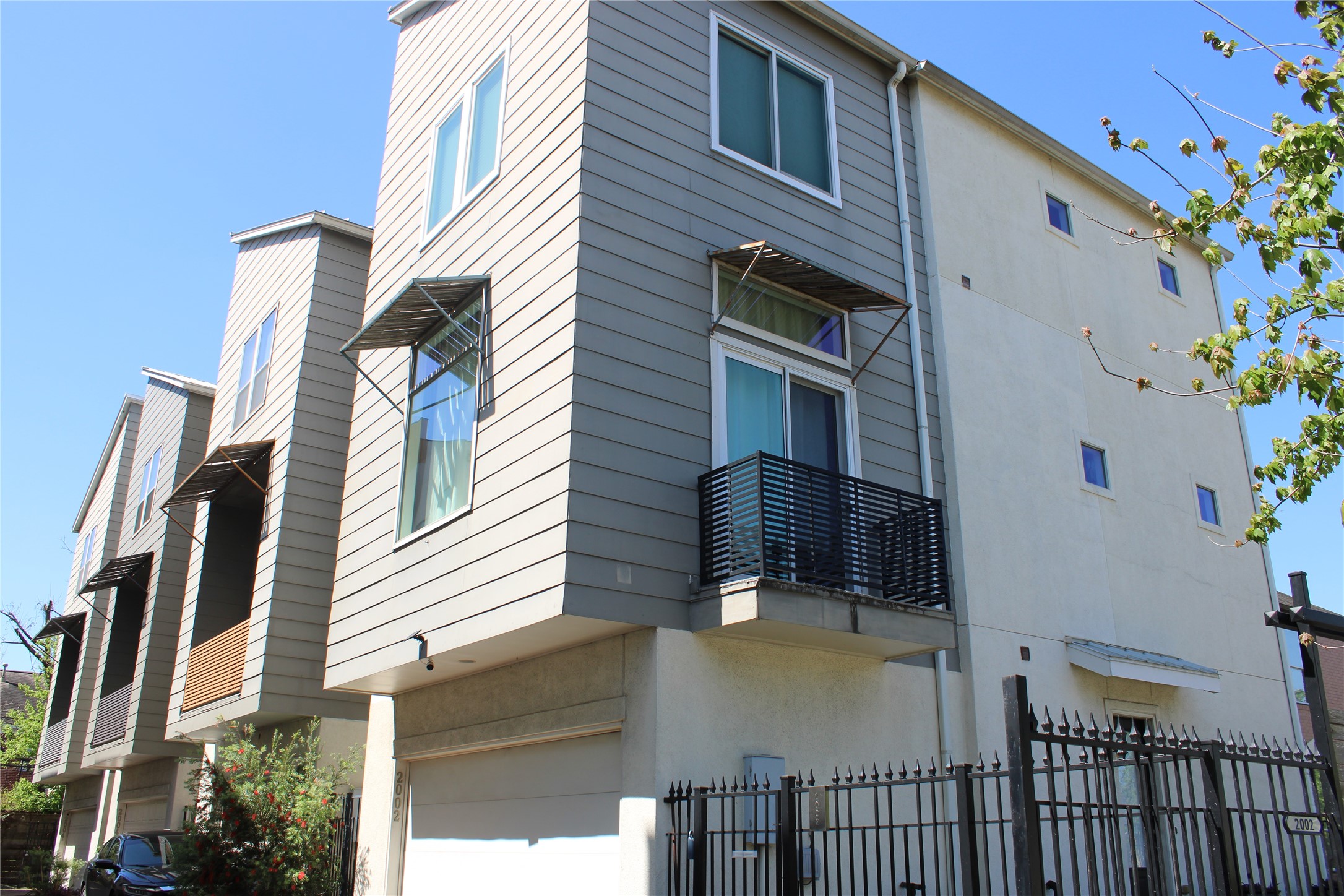 2002 Blodgett Street Houston, TX 77004 - Photo 42 of 43 a view of a house with a balcony