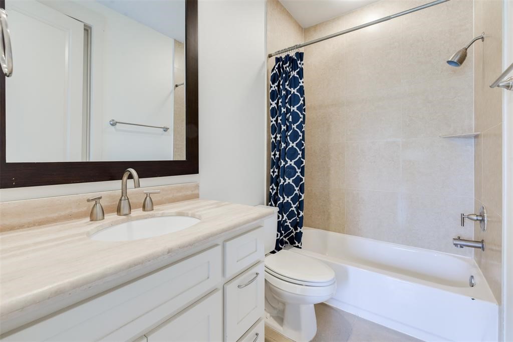 2002 Blodgett Street Houston, TX 77004 - Photo 5 of 43 a bathroom with a sink a toilet and shower