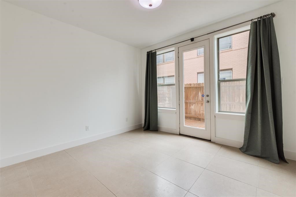 2002 Blodgett Street Houston, TX 77004 - Photo 6 of 43 a view of an empty room with a window