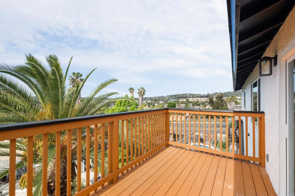 552 Felicita Avenue Spring Valley, CA 91977 - Photo 13 of 44 a view of balcony with wooden floor