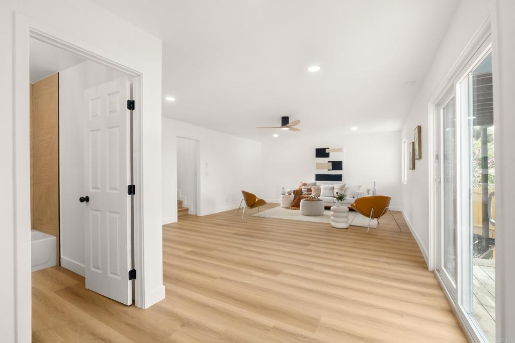 552 Felicita Avenue Spring Valley, CA 91977 - Photo 22 of 44 a room with a bed and a large mirror