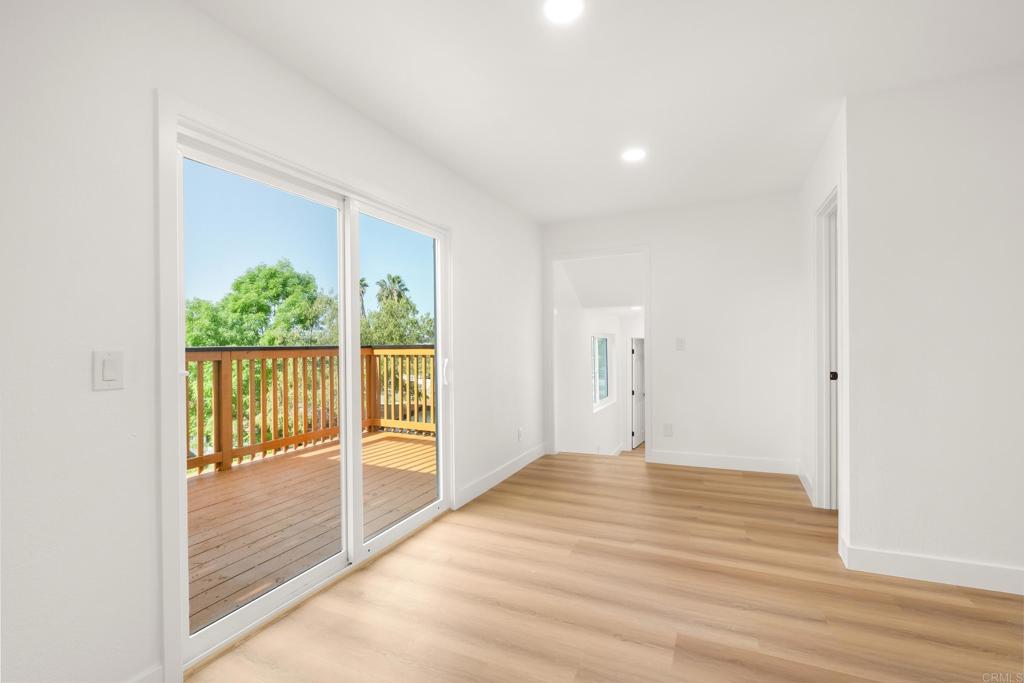 552 Felicita Avenue Spring Valley, CA 91977 - Photo 30 of 44 a view of a room with wooden floor and a window