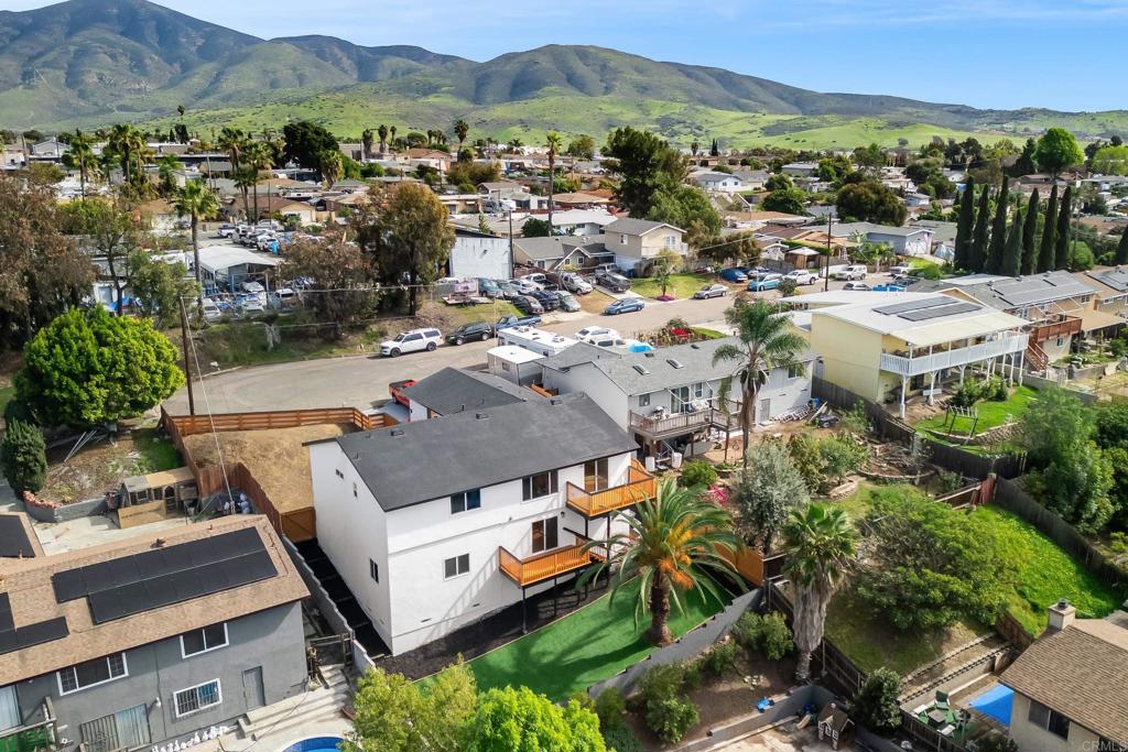 552 Felicita Avenue Spring Valley, CA 91977 - Photo 43 of 44 an aerial view of a house with a mountain