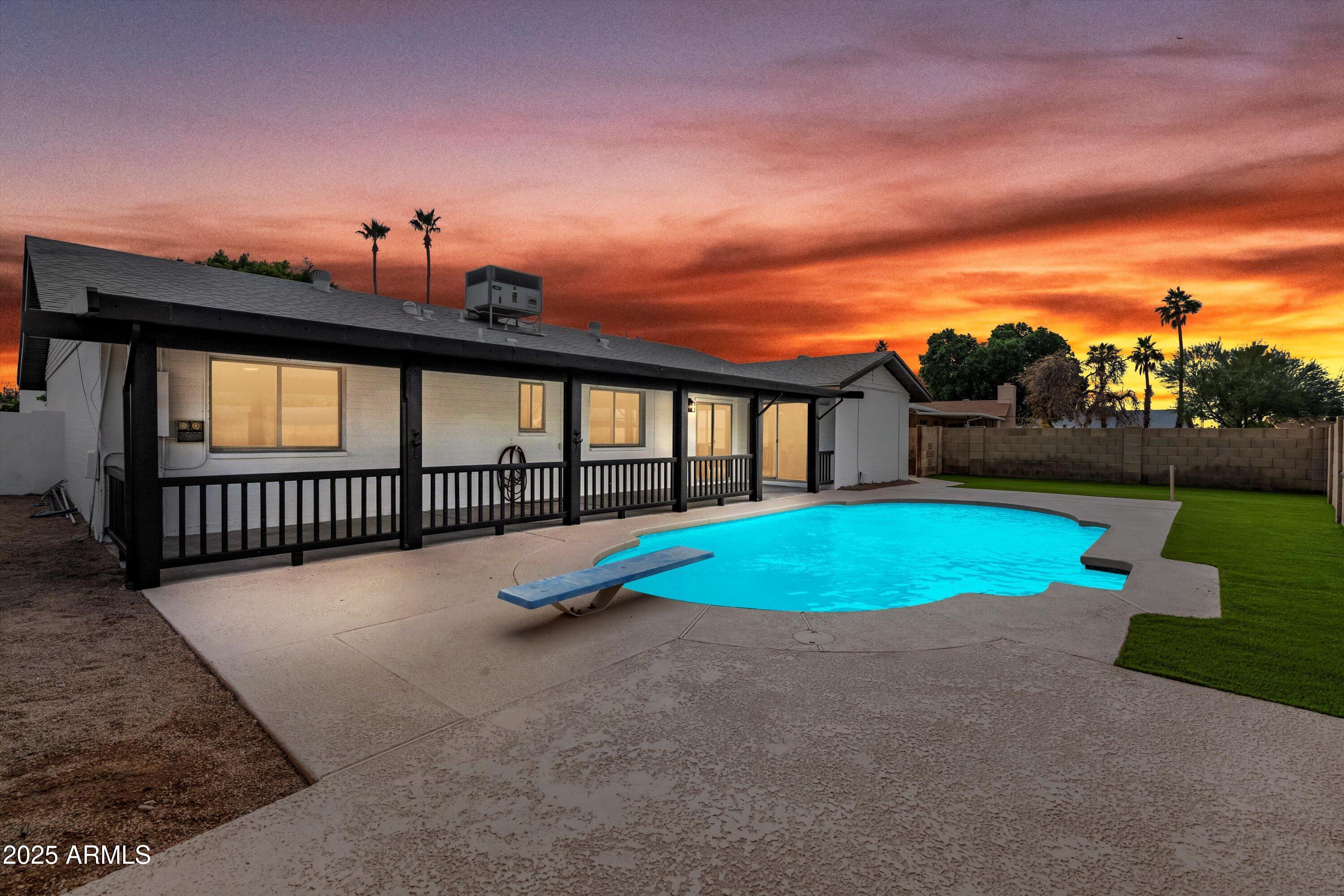 2116 East Colgate Drive Tempe, AZ 85283 - Photo 18 of 29 swimming pool with outdoor seating and garden