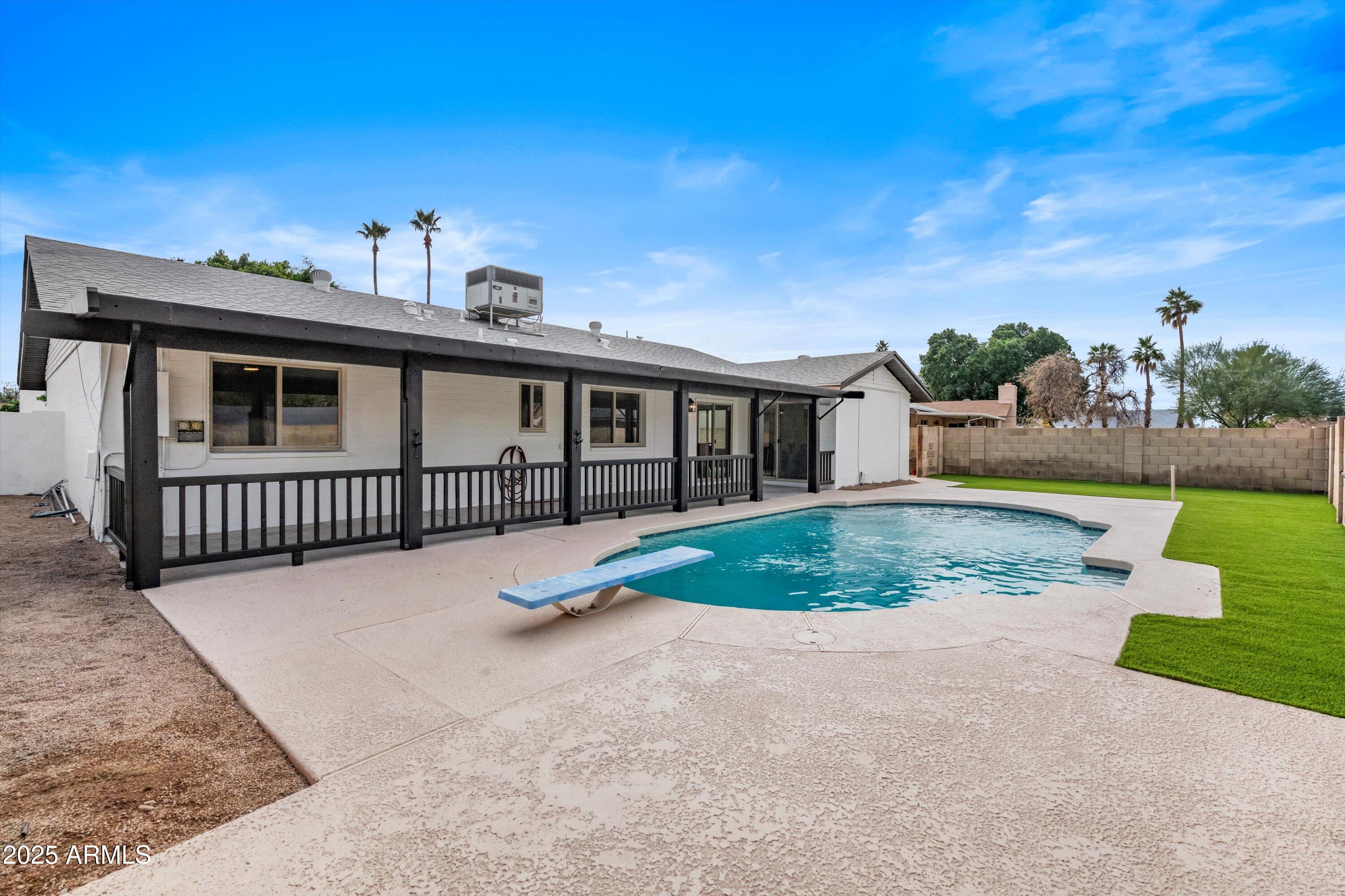 2116 East Colgate Drive Tempe, AZ 85283 - Photo 19 of 29 a view of a house with a yard