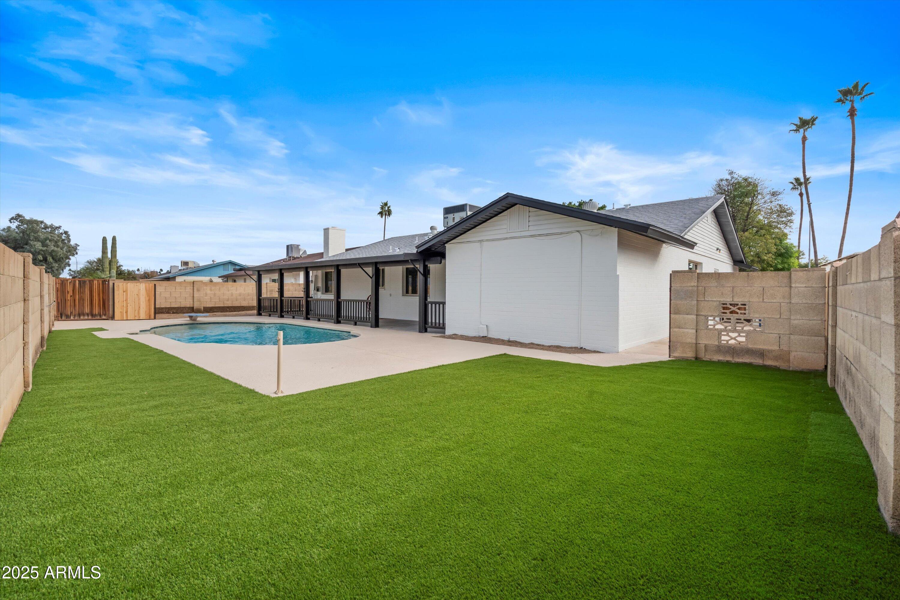 2116 East Colgate Drive Tempe, AZ 85283 - Photo 23 of 29 a view of a house with a backyard