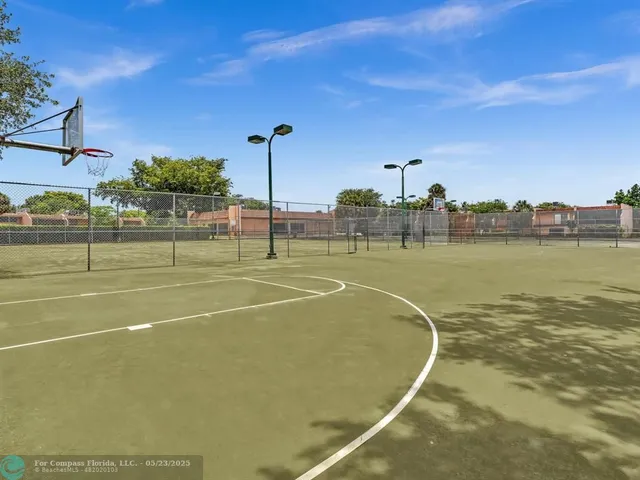 a view of a swimming pool with a garden