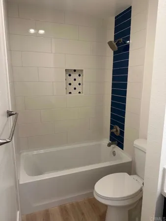 a close view of sink and washing machine